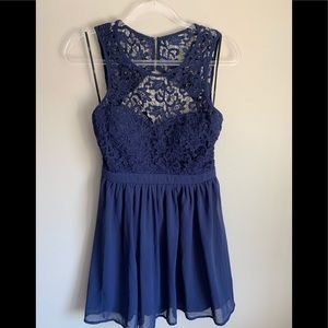 Navy blue mid length dress.